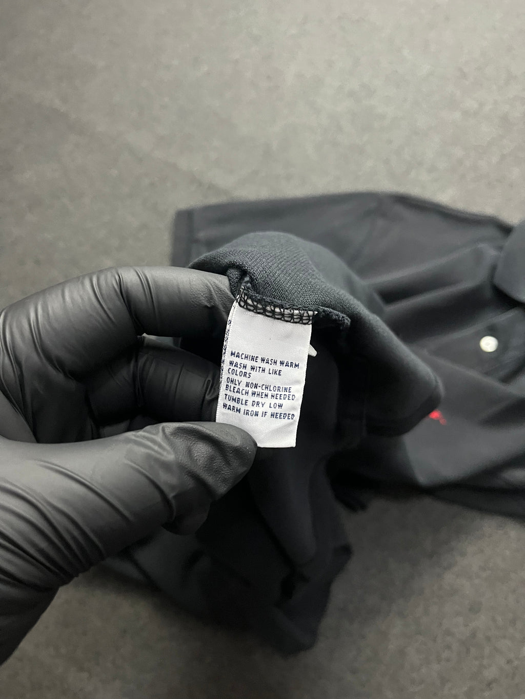 Polo Ralph Lauren black cotton polo shirt with a red embroidered logo