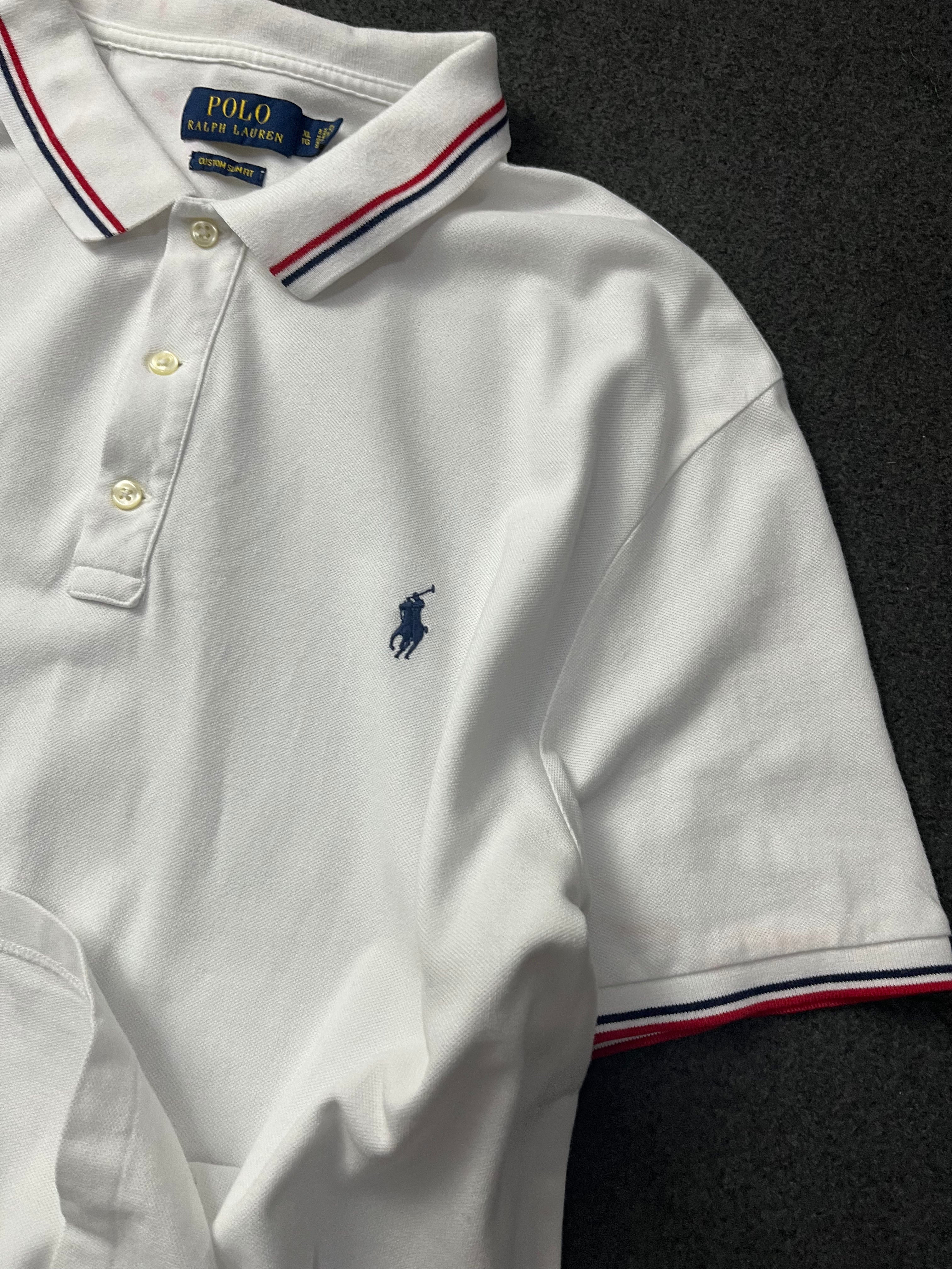 Polo Ralph Lauren classic fit short-sleeved polo shirt with red and navy blue striped tipping on the collar and cuffs