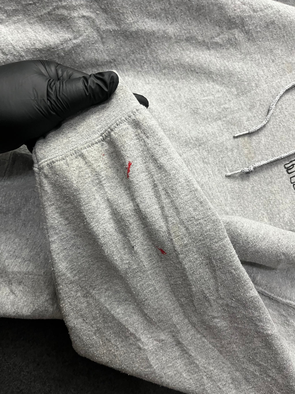 hoodie with a colorful graphic print on the back