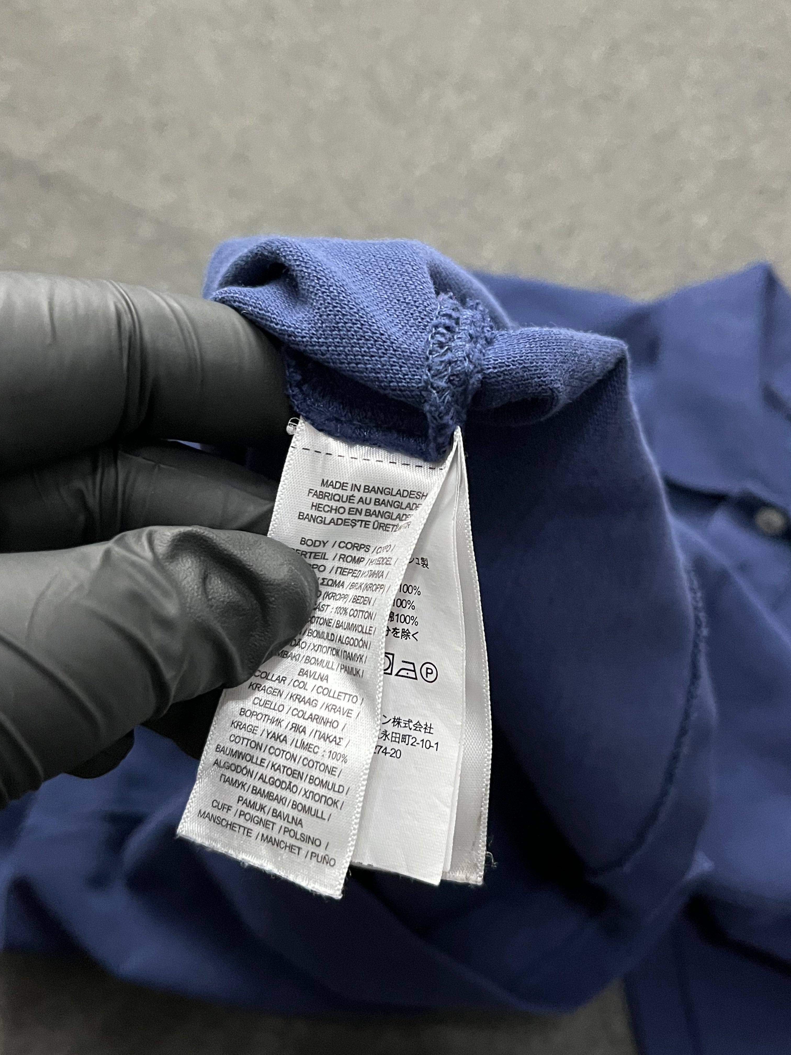 Polo Ralph Lauren short-sleeved polo shirt in a newport navy blue hue with the signature red Polo Pony