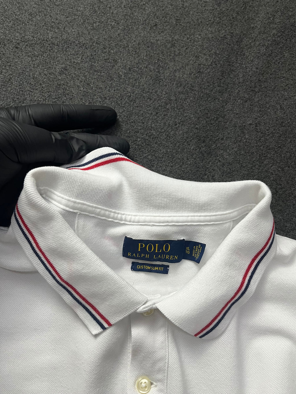 Polo Ralph Lauren classic fit short-sleeved polo shirt with red and navy blue striped tipping on the collar and cuffs