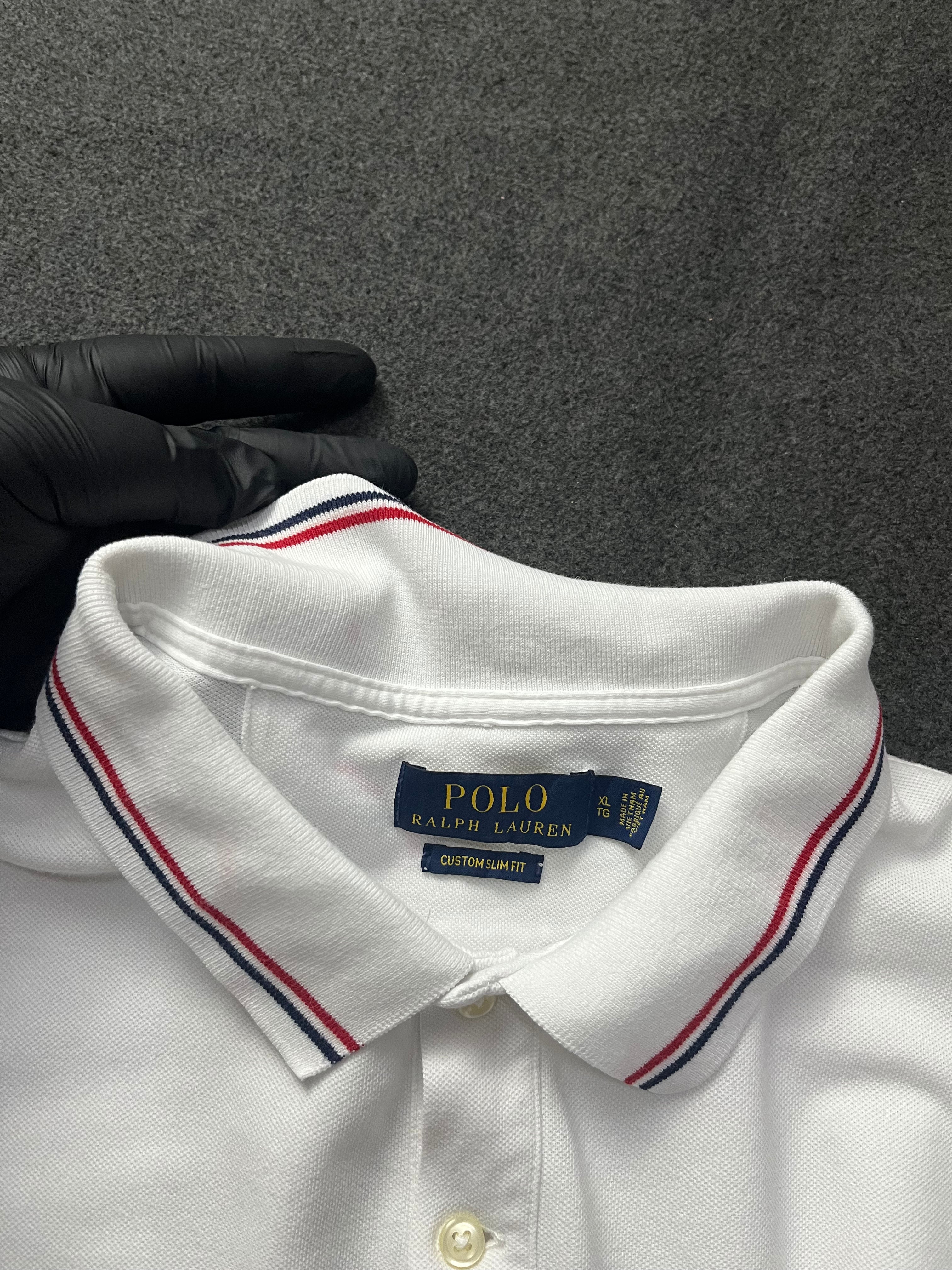 Polo Ralph Lauren classic fit short-sleeved polo shirt with red and navy blue striped tipping on the collar and cuffs