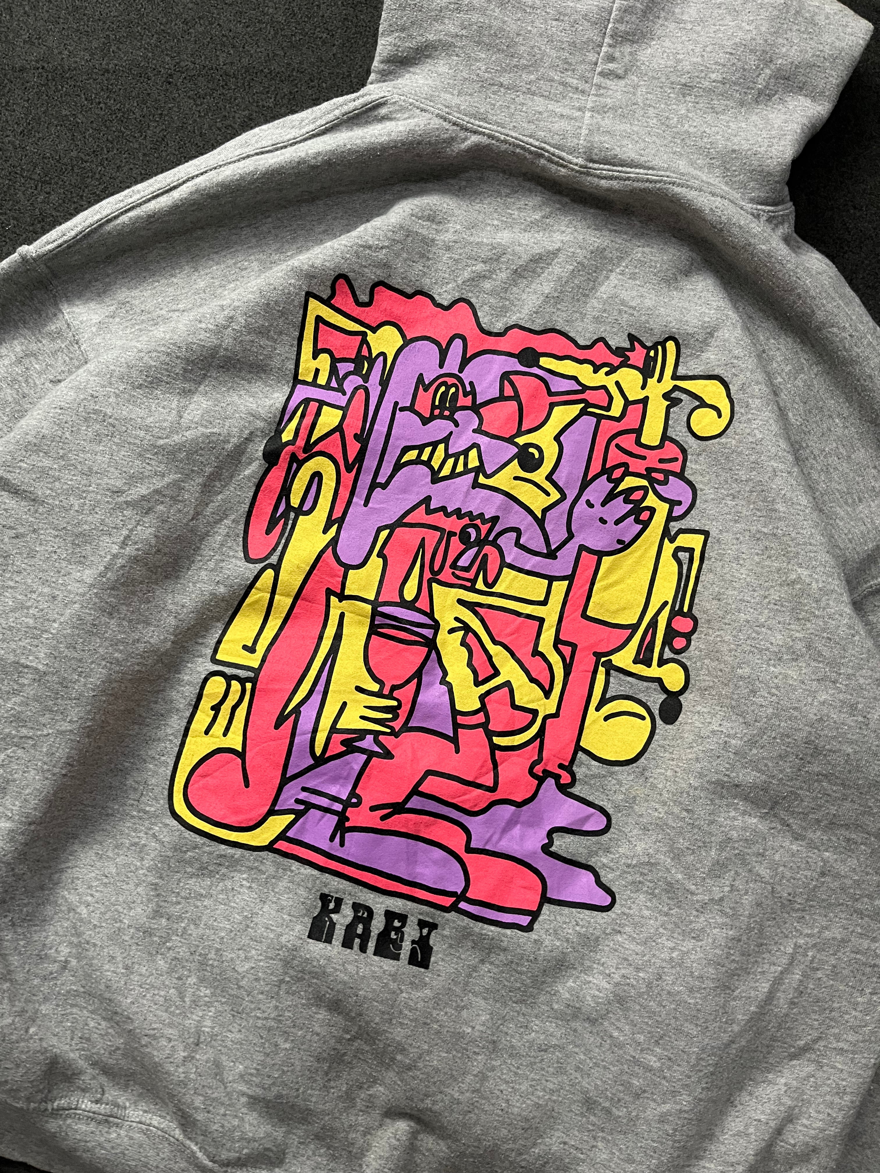 hoodie with a colorful graphic print on the back