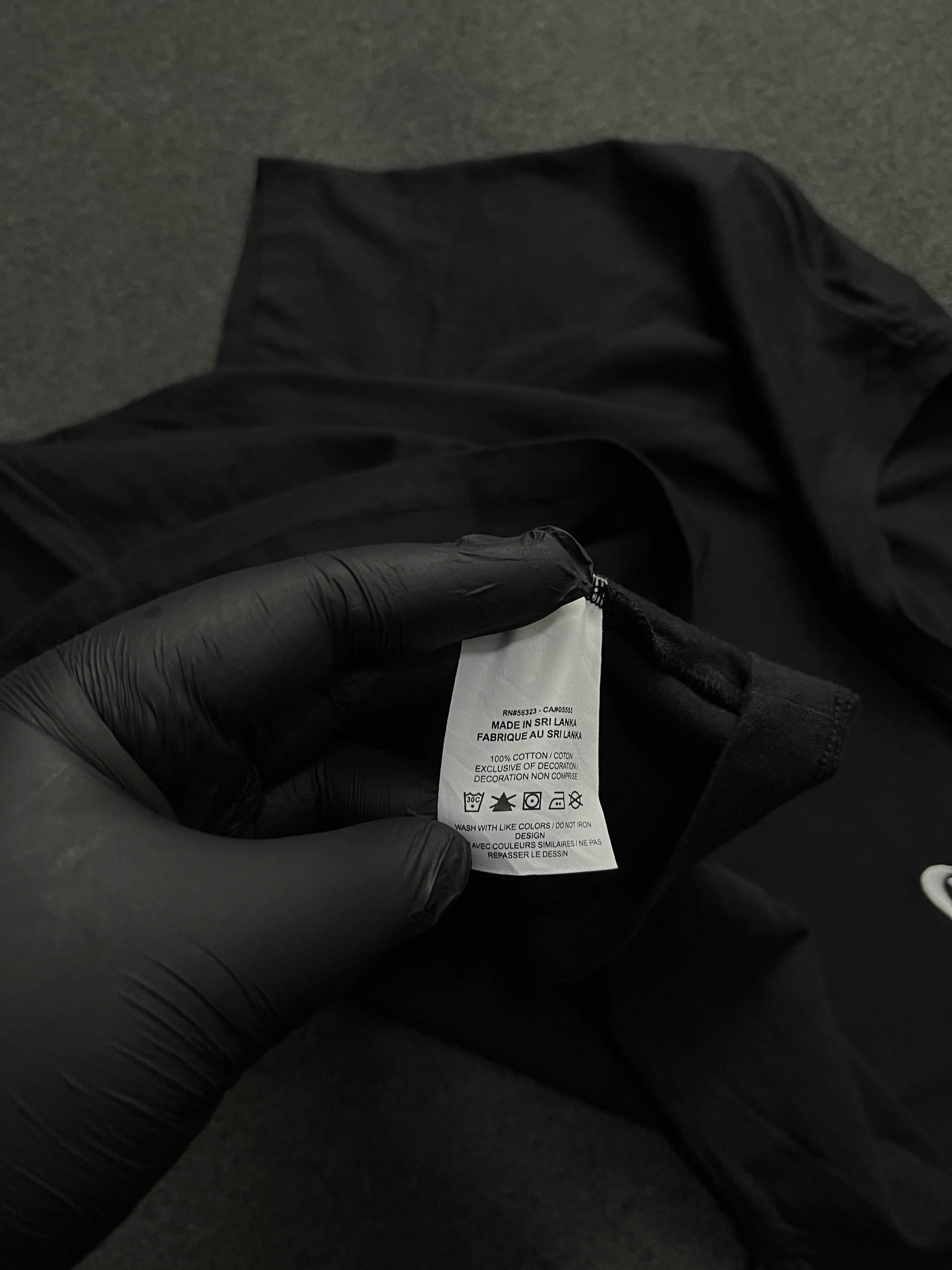 The Nike T-Shirt Embroidered Swoosh Tick Logo