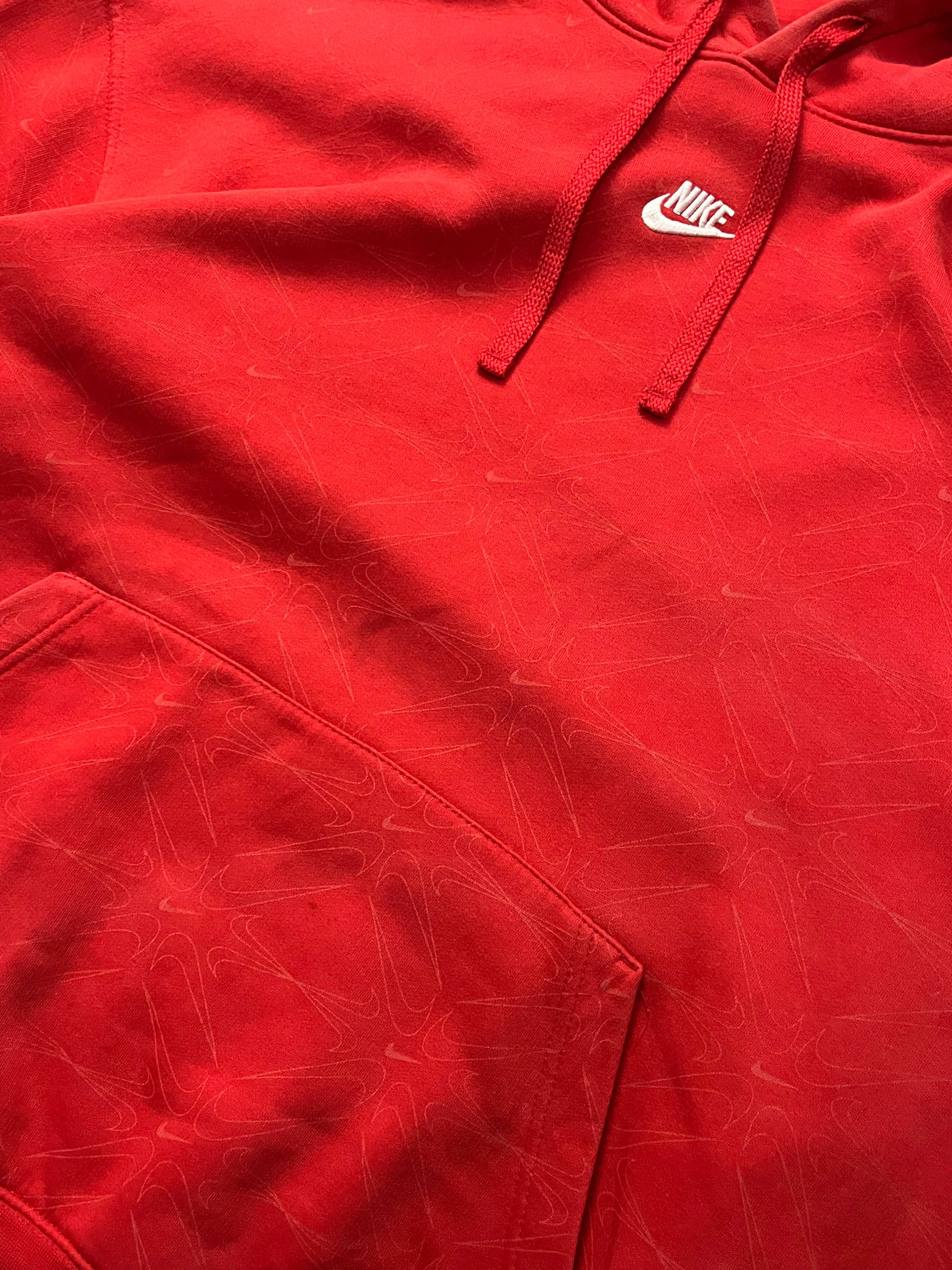 Red nike hoodie with nike all over