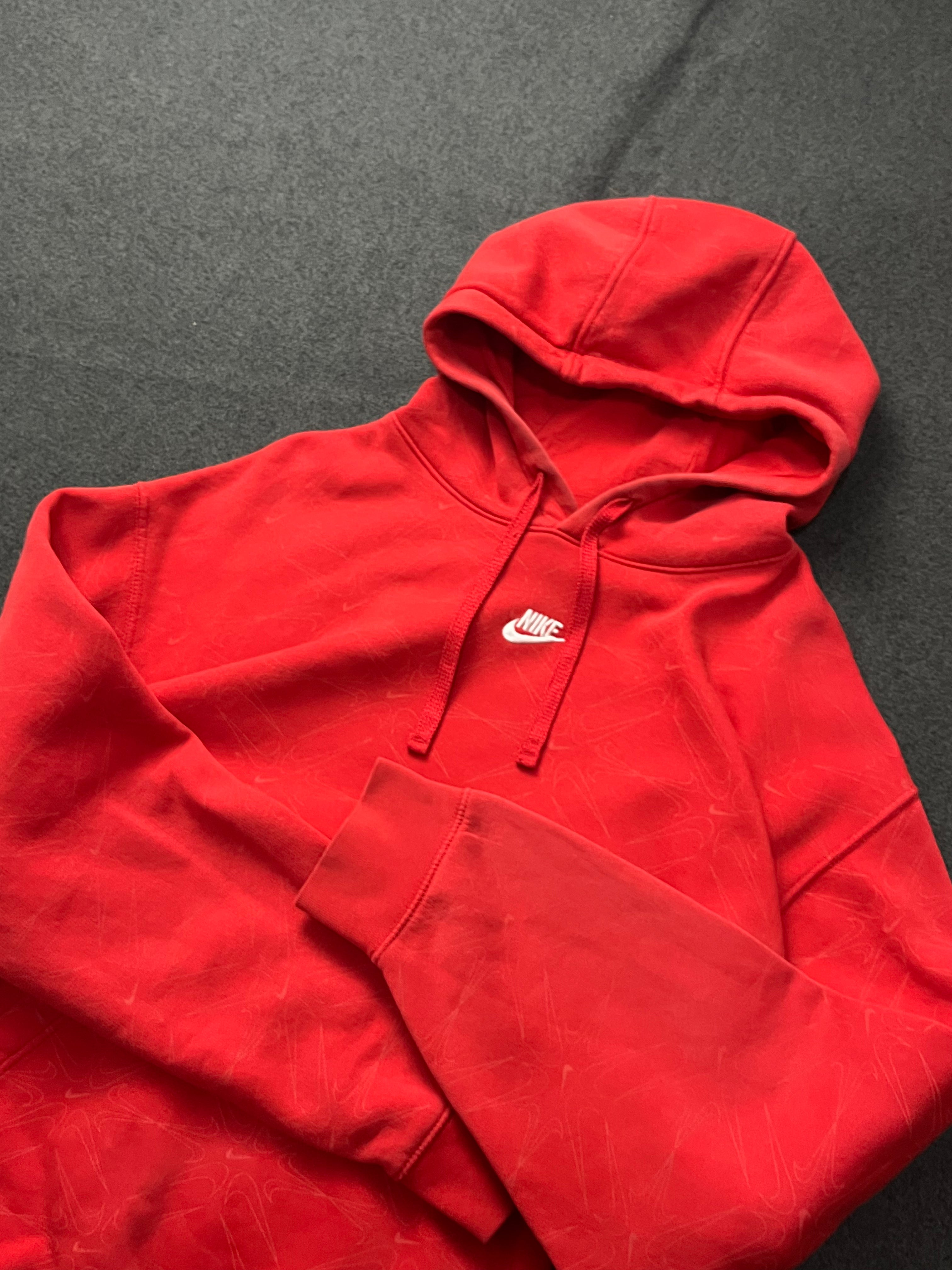 Red nike hoodie with nike all over