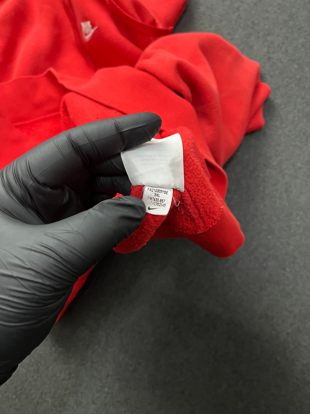 Red nike hoodie with nike all over