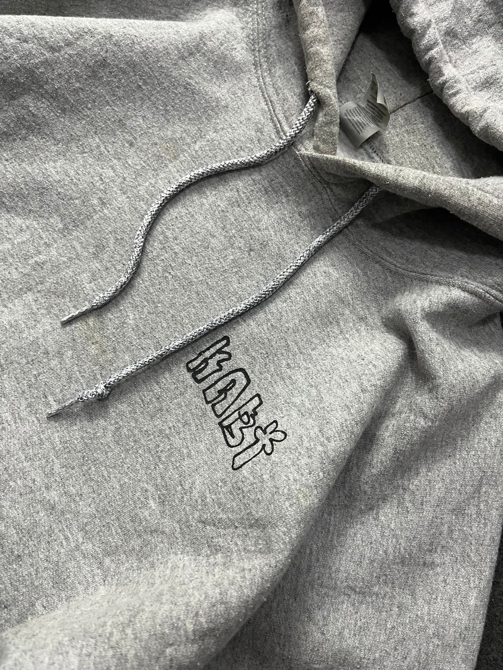 hoodie with a colorful graphic print on the back