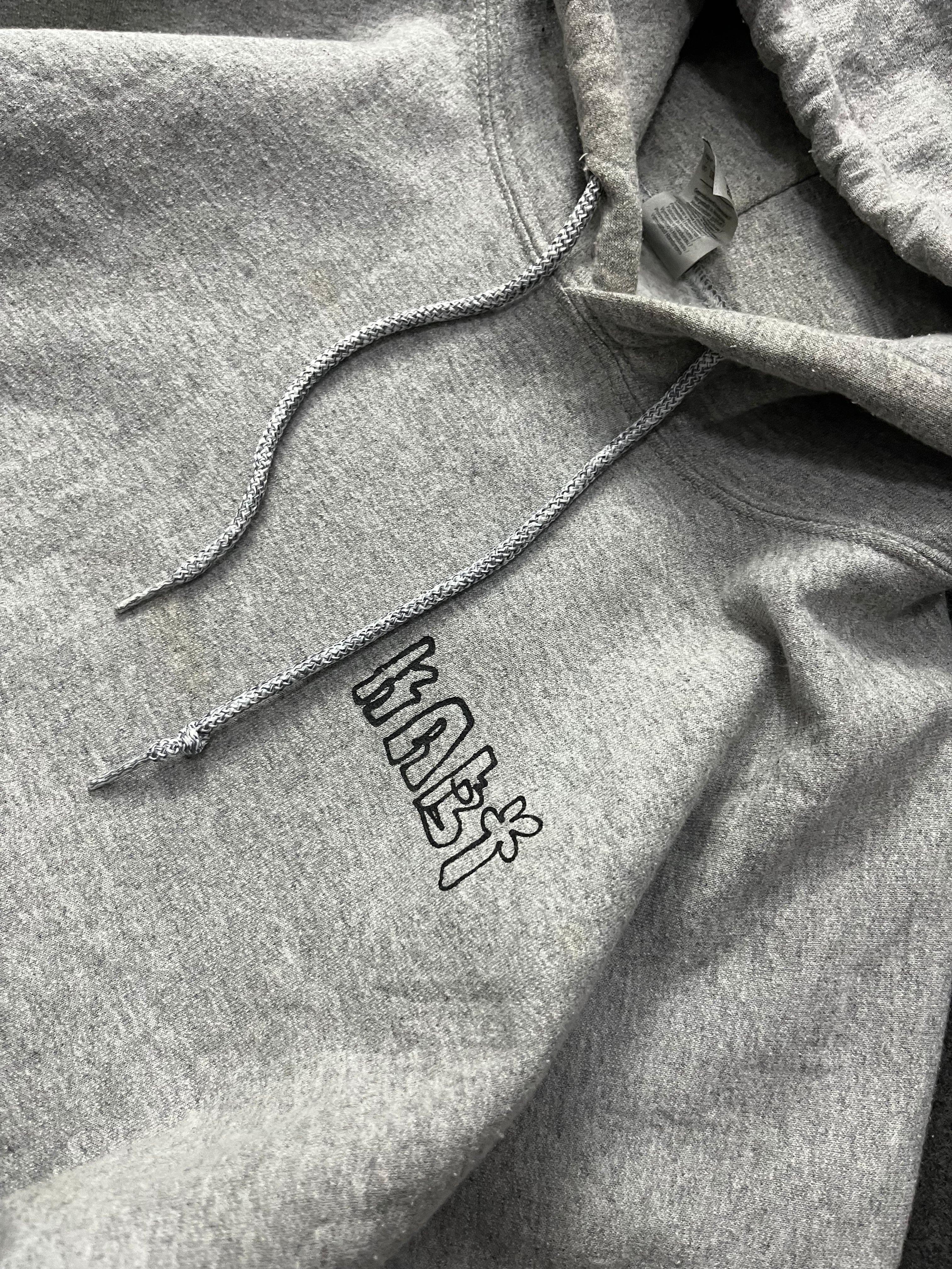 hoodie with a colorful graphic print on the back