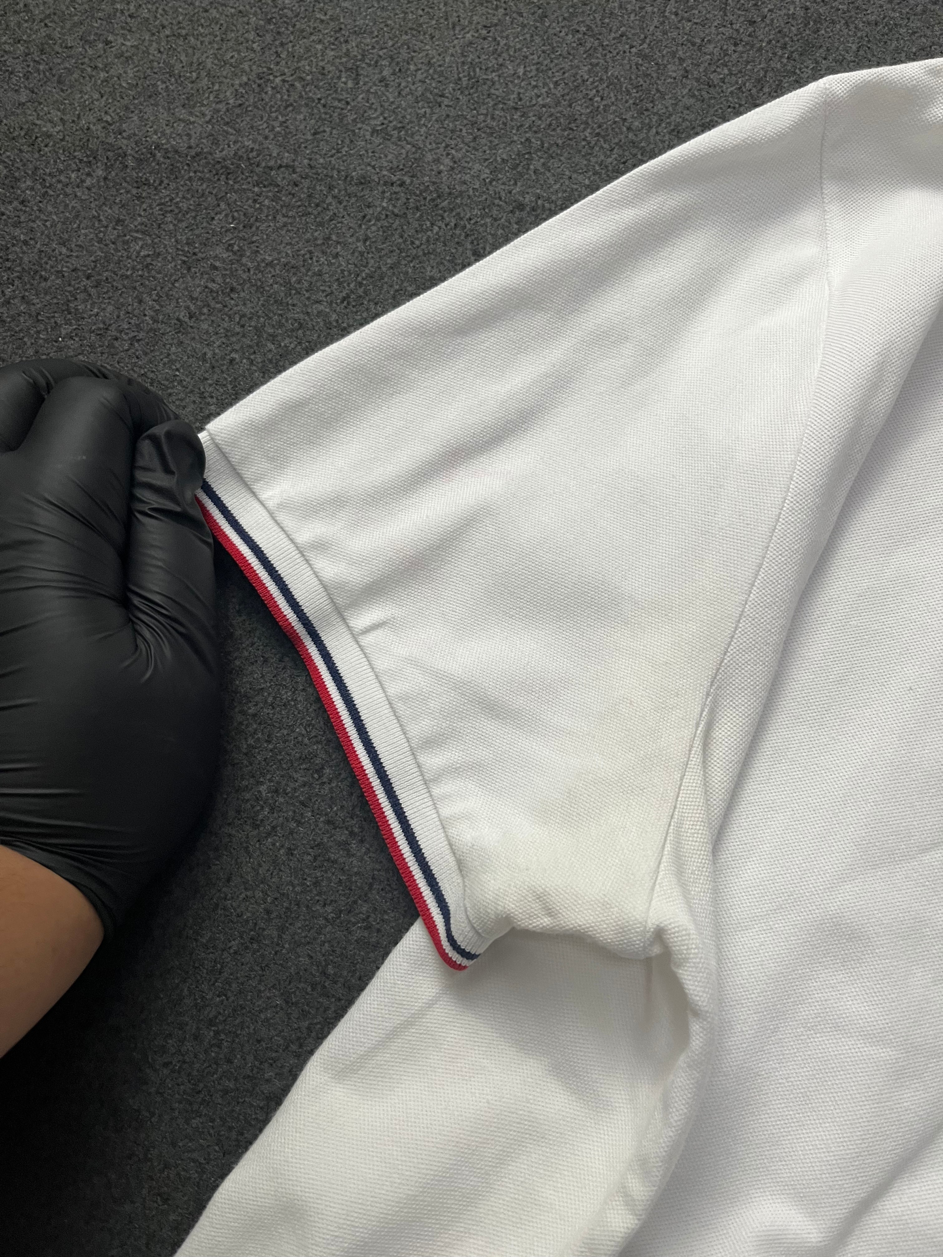 Polo Ralph Lauren classic fit short-sleeved polo shirt with red and navy blue striped tipping on the collar and cuffs