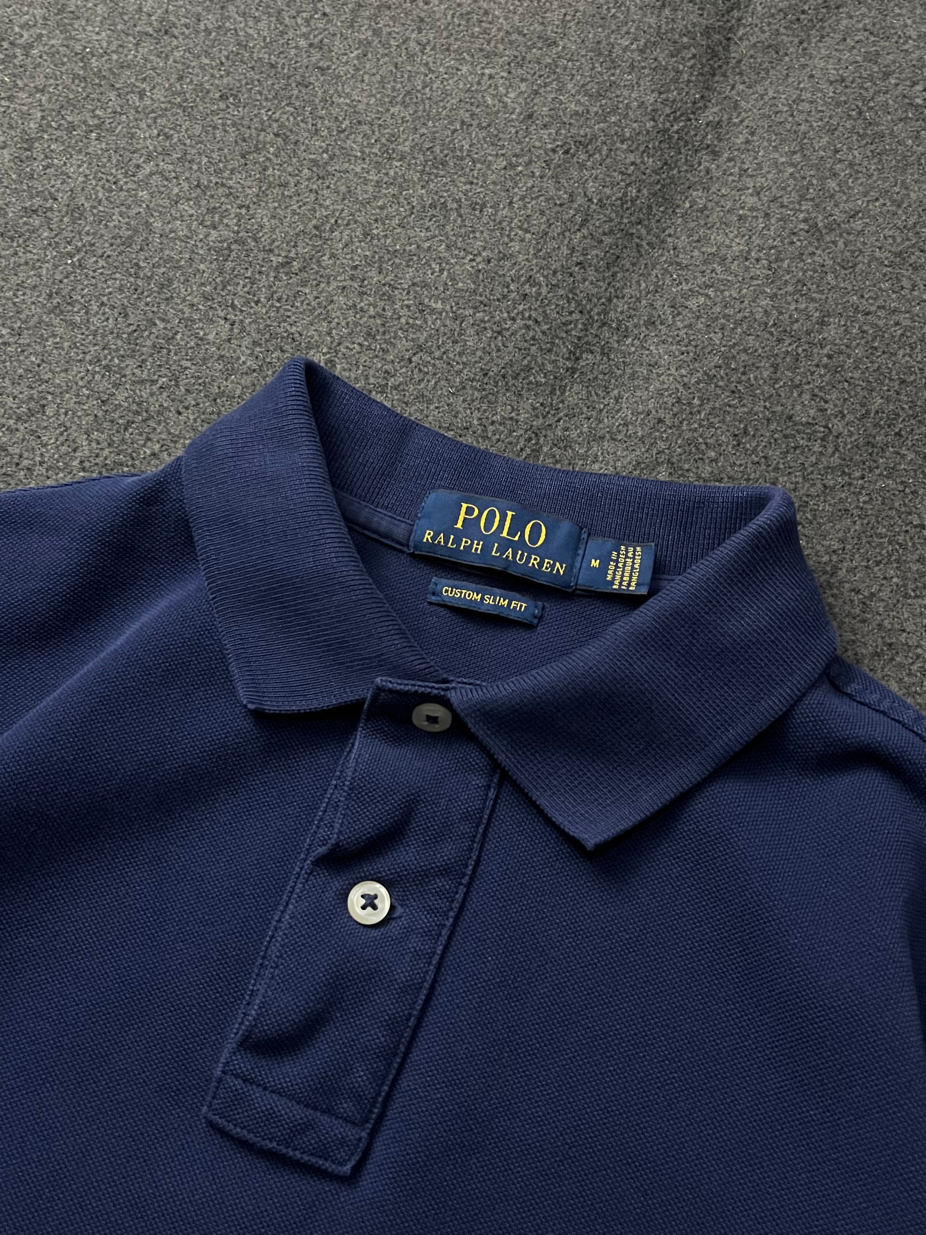 Polo Ralph Lauren short-sleeved polo shirt in a newport navy blue hue with the signature red Polo Pony
