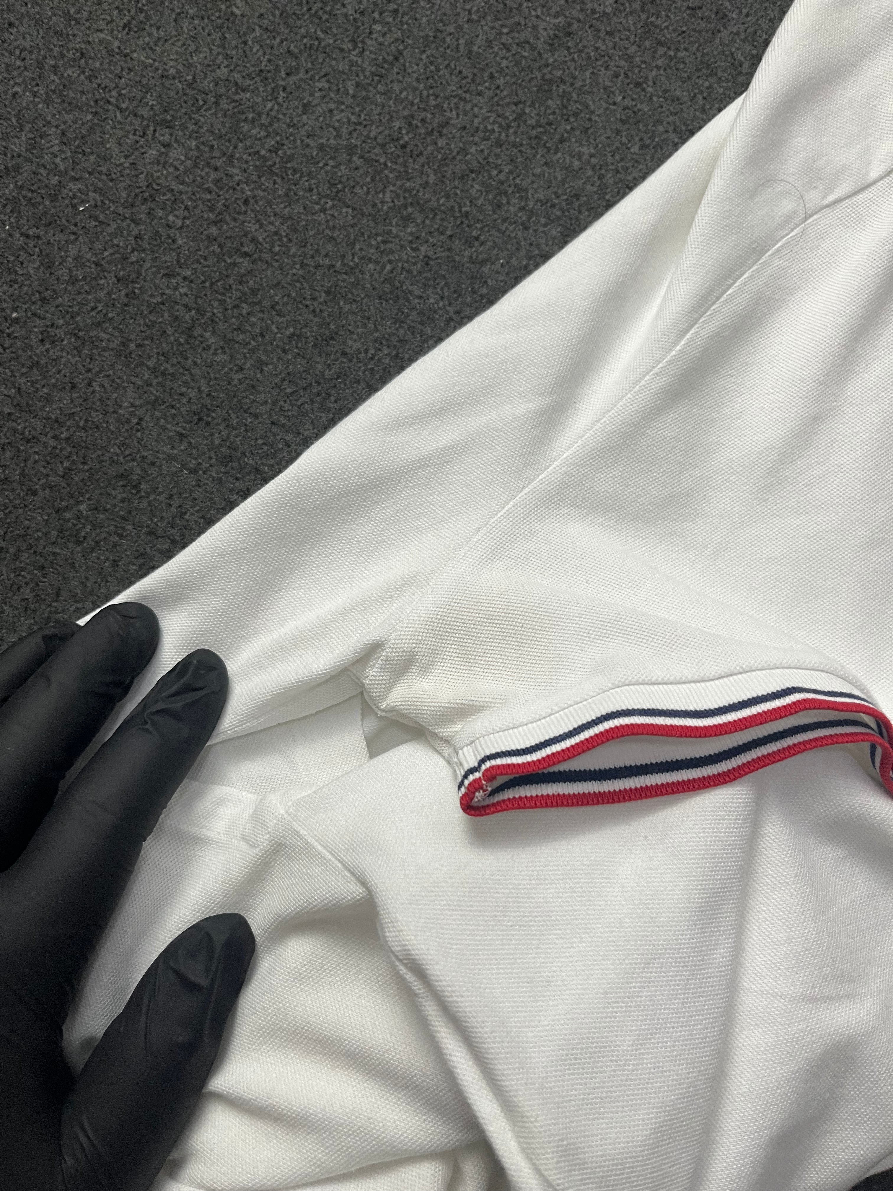 Polo Ralph Lauren classic fit short-sleeved polo shirt with red and navy blue striped tipping on the collar and cuffs