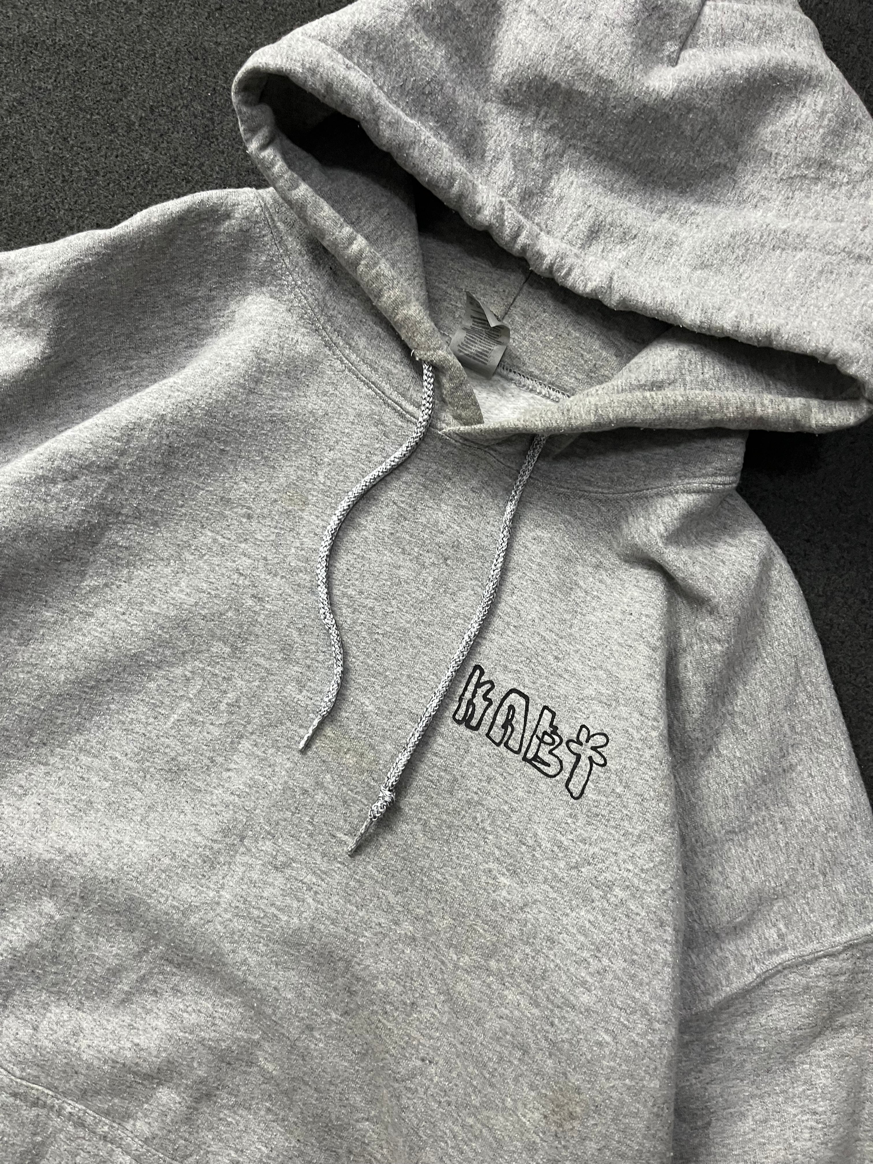 hoodie with a colorful graphic print on the back